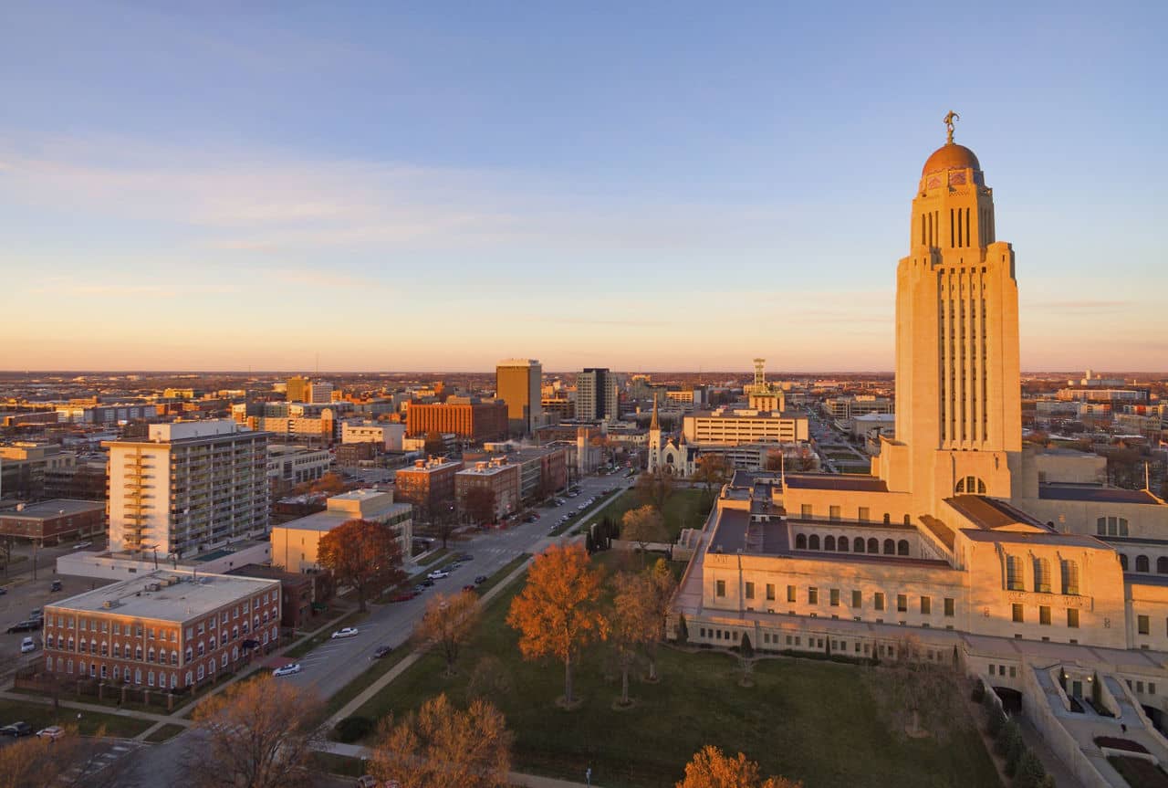 The sun sets over the State Capital Building in Lincoln Nebraska