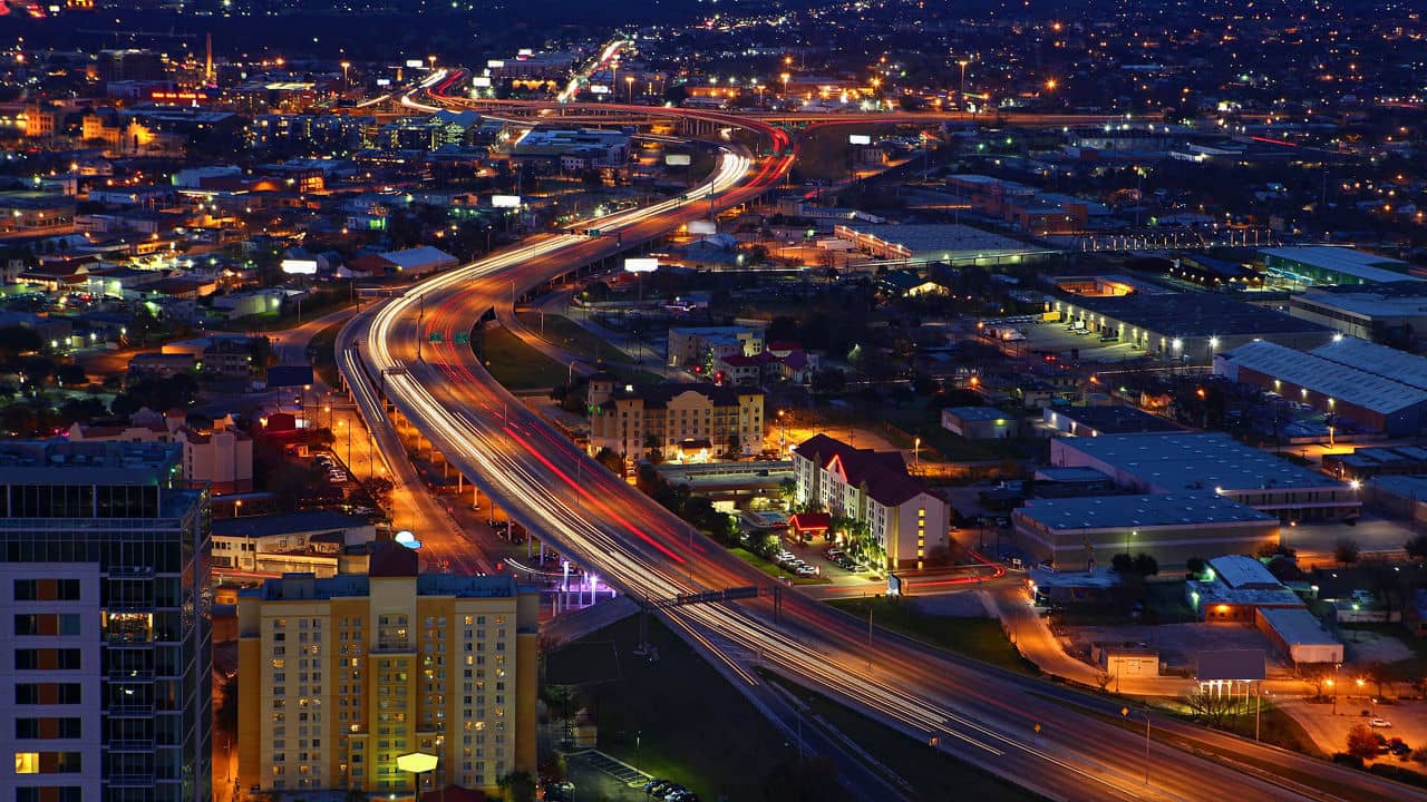 An aerial of San Antonio, Texas expressways at night