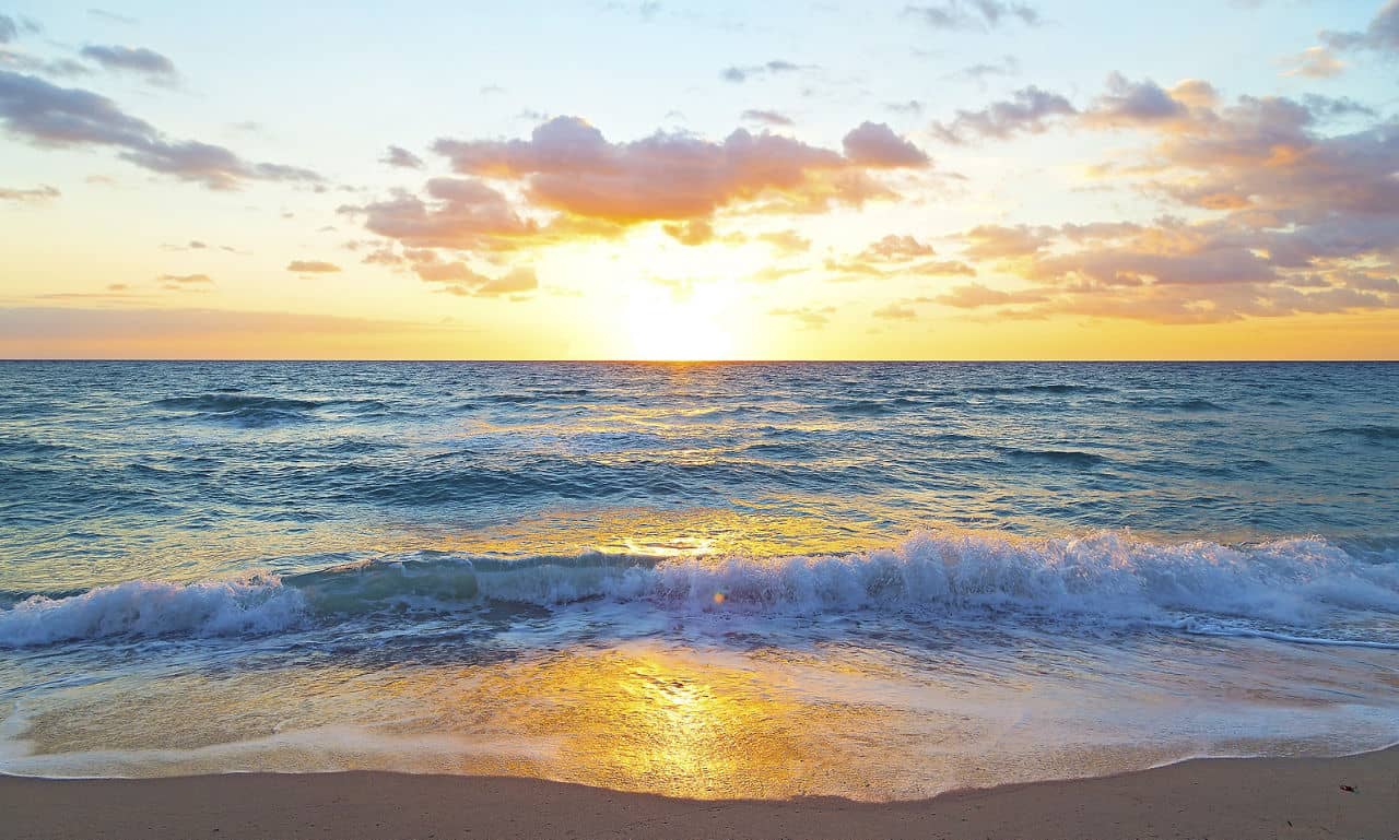 Sunrise over the ocean in Miami Beach, Florida. Spring sunrise at the empty beach.