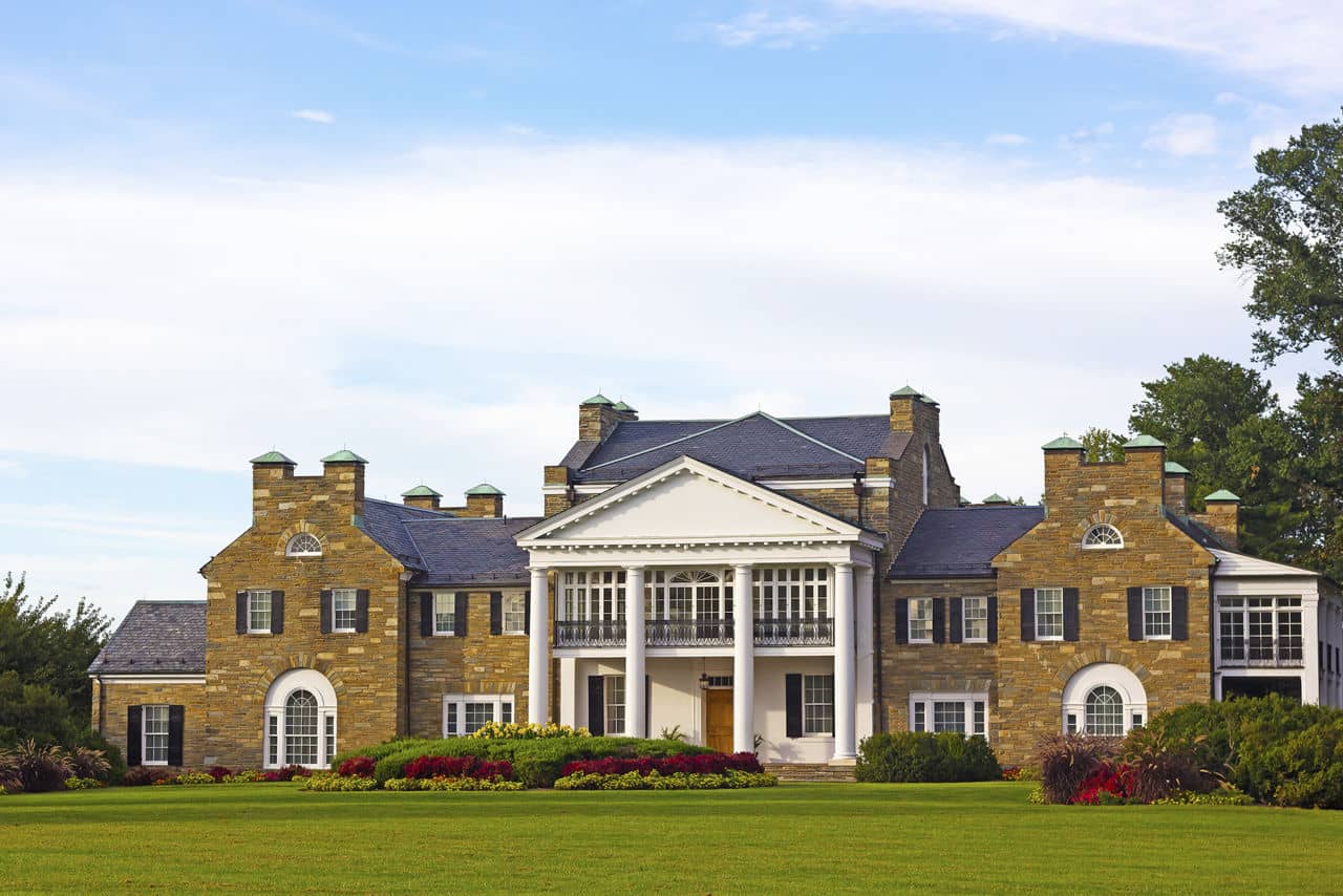 Glenview historic mansion with formal gardens at sunset. Historic Mansion at Civic Center Park in Rockville, Maryland, USA