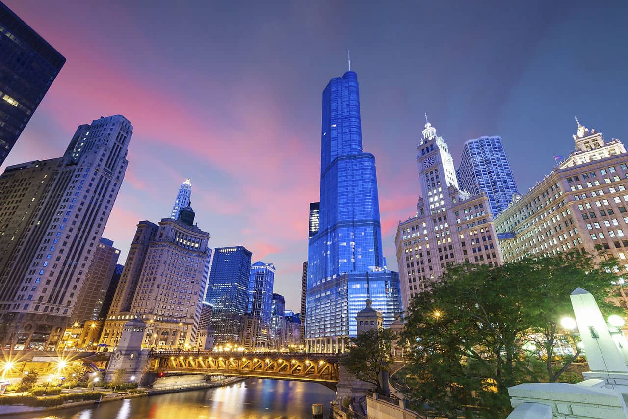 City of Chicago. Image of Chicago downtown and Chicago River with bridges at twilight.