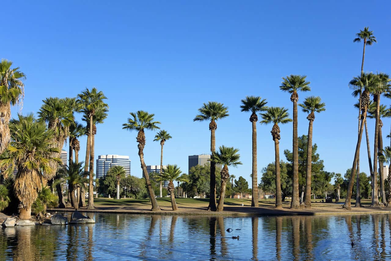 Bright blue winter sky on the lake in Encanto park located right in downtown of Phoenix, Arizona; Copyspace