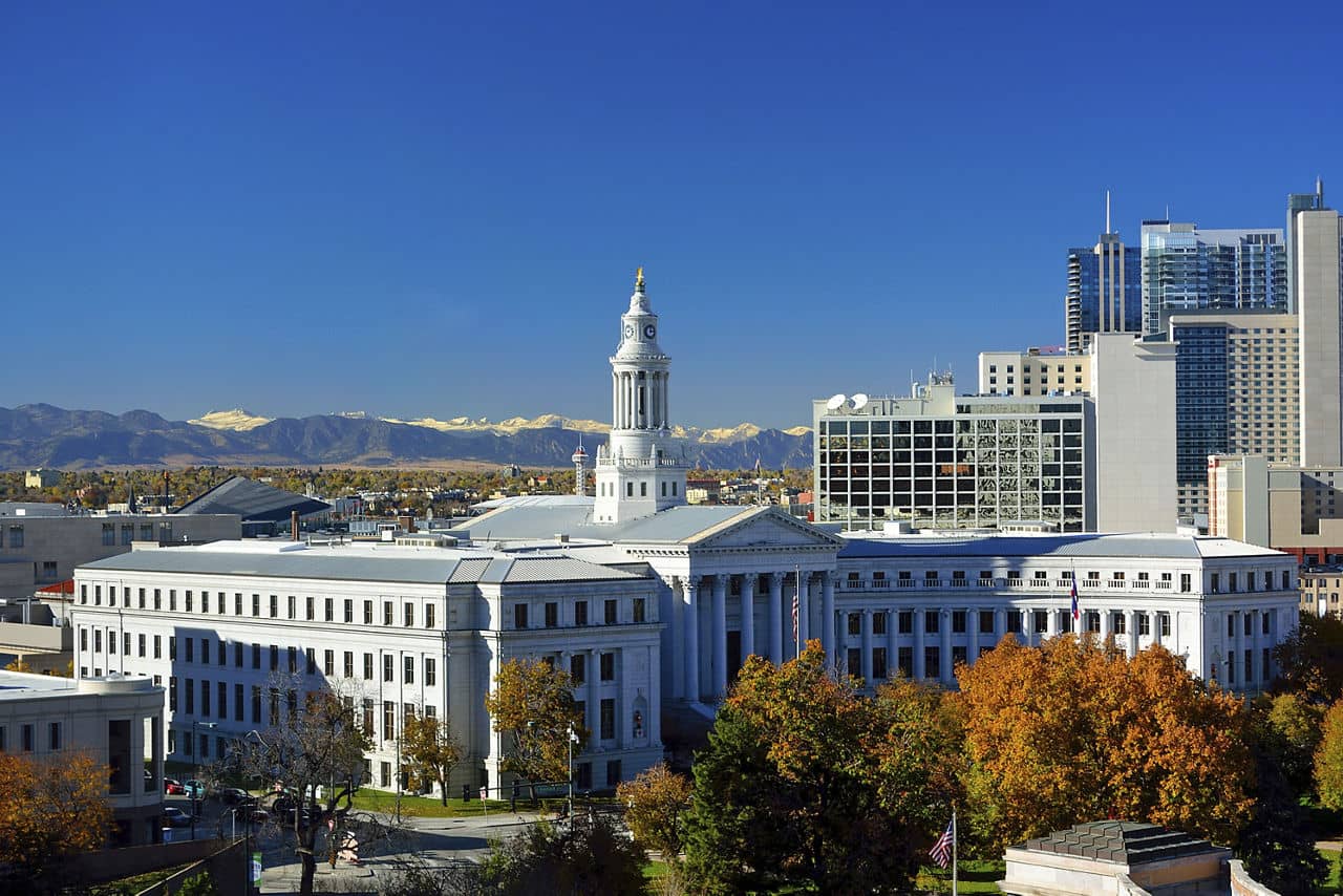 Denver, Colorado City Hall with Colorful Fall Leaves and the Rocky Mountains in the Background