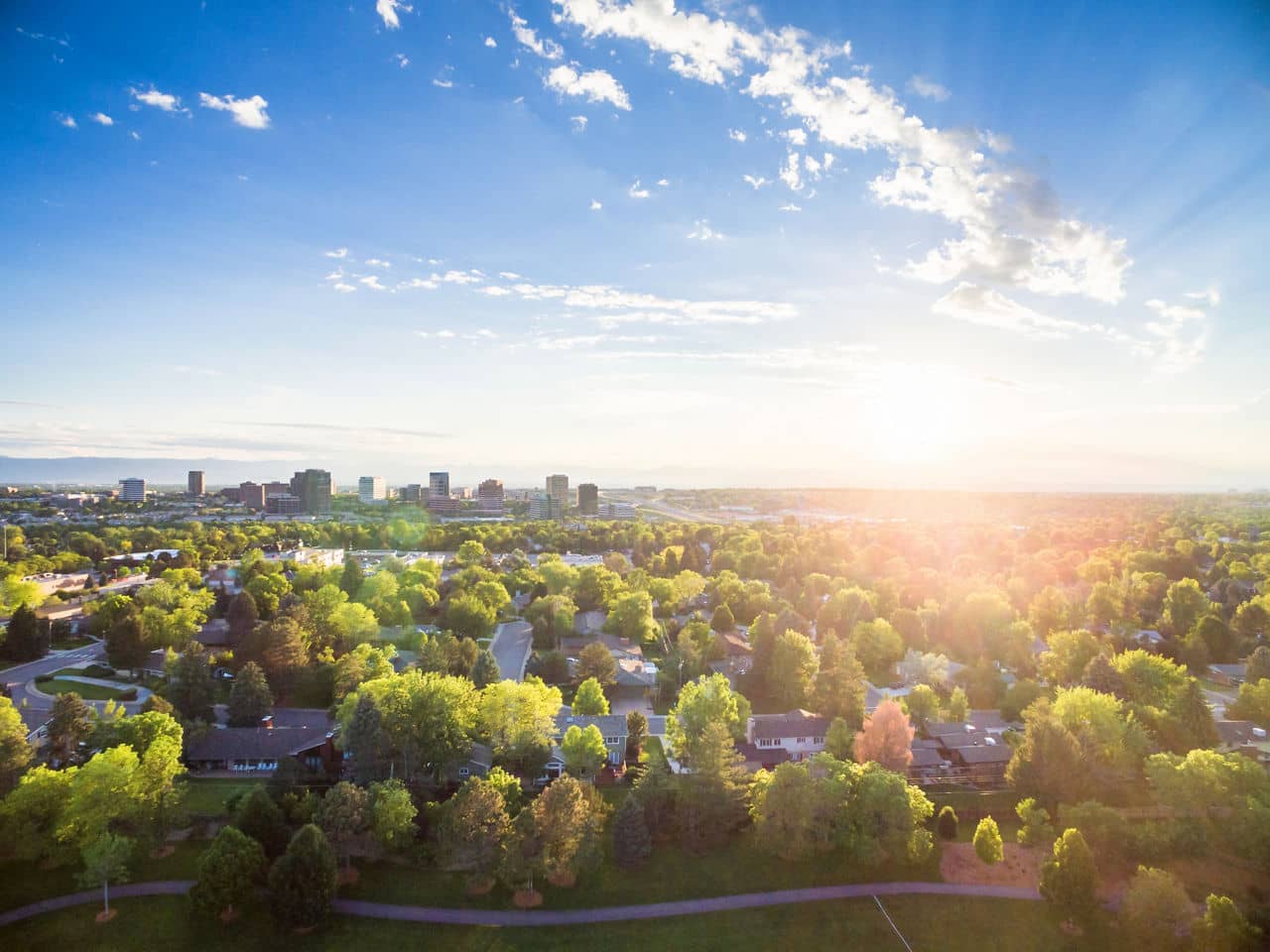 Aerial view of residential neighborhood with view to the mountains.