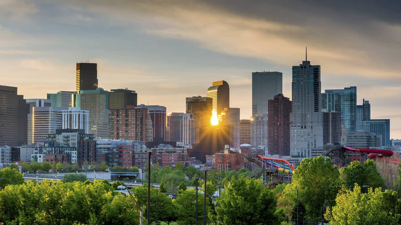 City of Denver Colorado with morning sun star