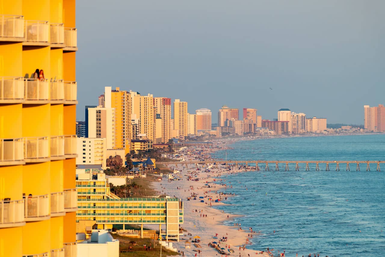 Aerial view of Panama City, Florida skyline and beach on a busy day