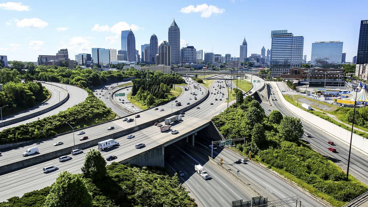 Aerial view from Lawrenceville/Loganville, GA showing a busy highway with multiple lanes of traffic leading to Atlanta.