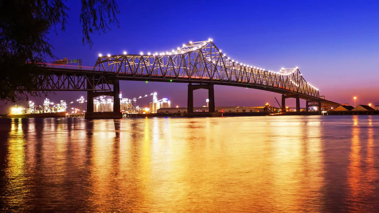 Horace Wilkinson Bridge crosses over the Mississippi River at night in Baton Rouge, Louisiana
