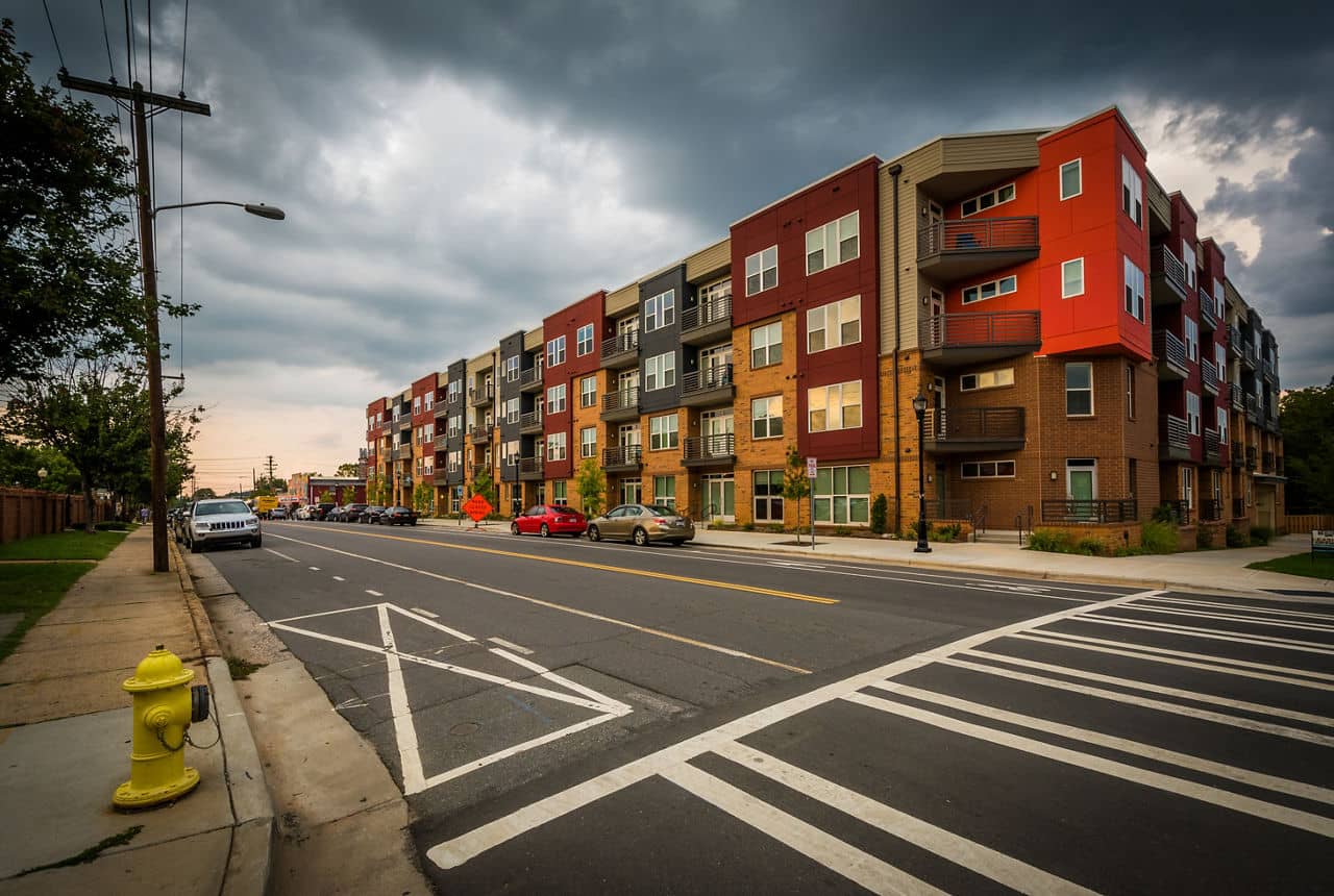 Intersection and commercial buildings in the vibrant NoDa arts district of Charlotte, North Carolina.